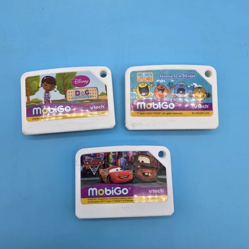 Lot of 3 Mobigo Cartridges Games Cars2 Doc McStuffins Mr. Men Little Miss